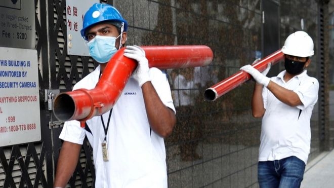 Coronavirus: Singapore quarantines 20,000 migrant workers