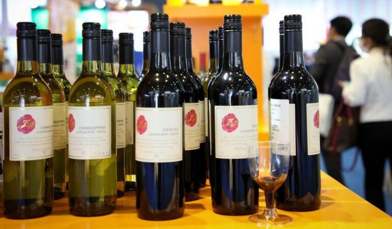 China slaps up to 200% tariffs on Australian wine - BBC