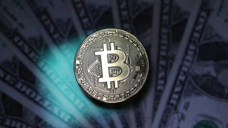 Bitcoin's market value tops $1 trillion